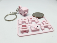 a 3D printed pig keychain